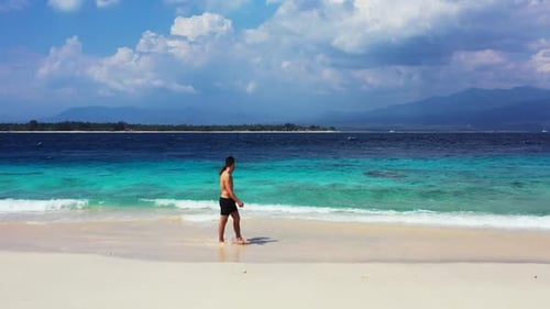 Two lovers tan on perfect tourist beach journey by clear lagoon and clean sandy background of Gili M