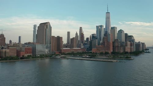 Aerial Drone Shot Ascending Towards Downtown a Dense Cityscape (Manhattan, New York)
