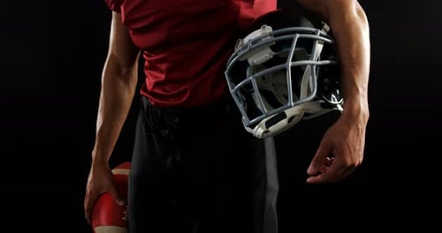 Football Player with Helmet and Football