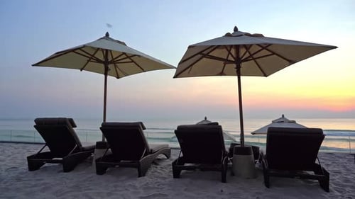 Beautiful tropical sea beach around with umbrella chair on blue sky