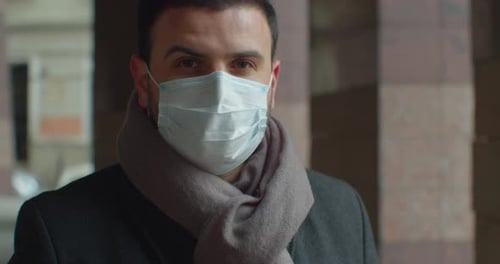 Man Wearing Mask in Urban Area Close Up