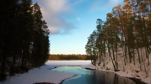 DAY TO NIGHT TIMELAPSE, The Northern Lights dance above a stream