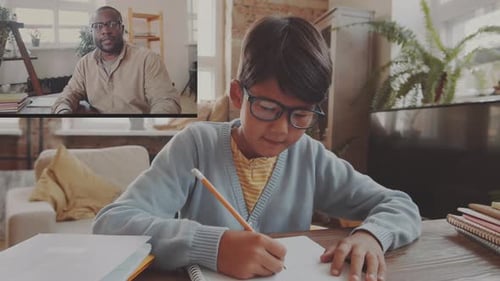 Boy Attends an Online Tutoring Session at Home