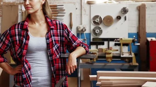 Smiling Woman in Woodworking Shop