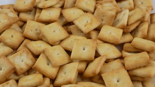 Heap of Delicious Square Golden Brown Crackers