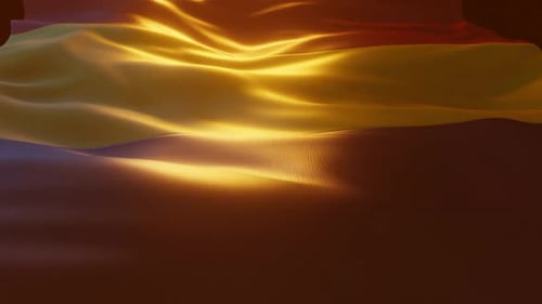 German Flag Waving Fluidly in Golden Light