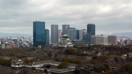 Osaka Castle in Skyscrapers Background Timelapse