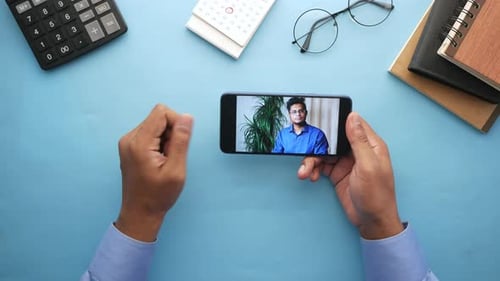 Businessman Working in Video Conference Close Up