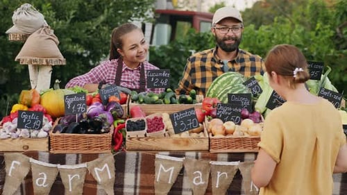 Woman Buying Organic Groceries at Farmers Market
