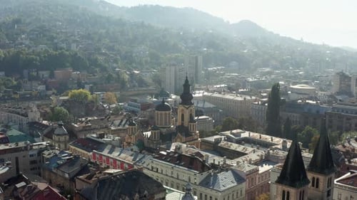 Drone Video of a Church with Towers Standing in the Center of the City