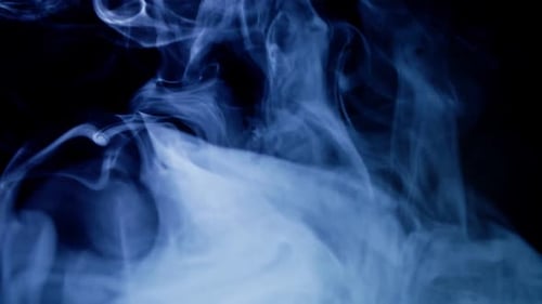Abstract Blue Smoke Flowing on Black Background