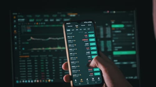Mobile Phone Shows Stock Data and Trends