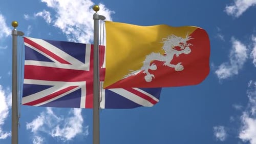 Drapeau du Royaume-Uni contre le drapeau du Bhoutan sur le mât