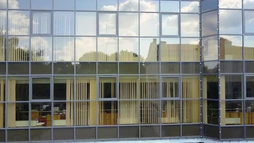 Glass Office Building Exterior with Reflections