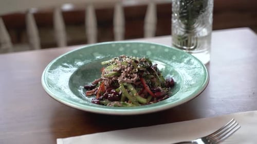 Colorful Salad Plate on Wooden Table Close Up