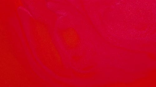 Fluid Glittering Red and Orange Abstract Background