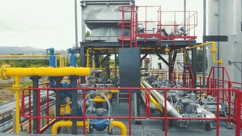 Aerial View Gas Production Station. Metal Construction with Valves on the Pipes. Distribution and