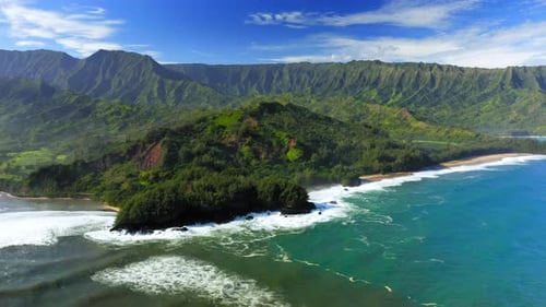 Hawaii. USA. Inspiring View Over Green Exotic Island and Peaceful Ocean Washing the Shore. Aerial