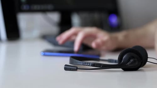 Close-up, headphones lie on the desktop