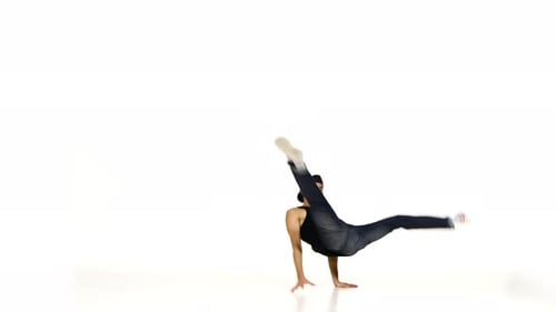 Young Man Breakdancing With Complex Moves