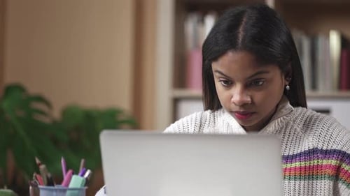 Young Black Female University Student Studying on Computer at Home