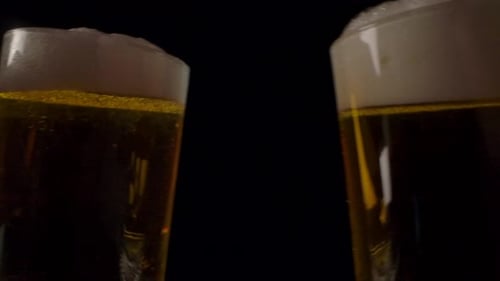 Crop Friends Clinking Mugs of Beer