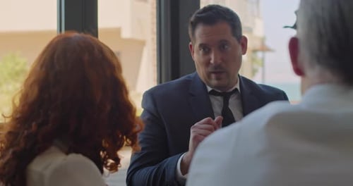 Business Team Discussing Strategy in Modern Office