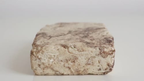 Tilting over sesame halva close-up 4K footage