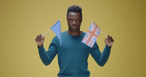 Man Smiling and Waving EU Flag
