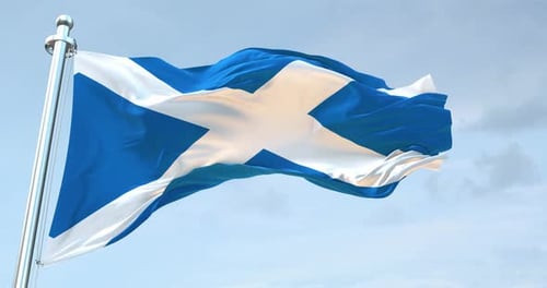Waving Flag of Scotland Against Sky