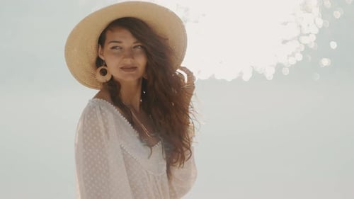 Woman Resting on the Beach During Vacation