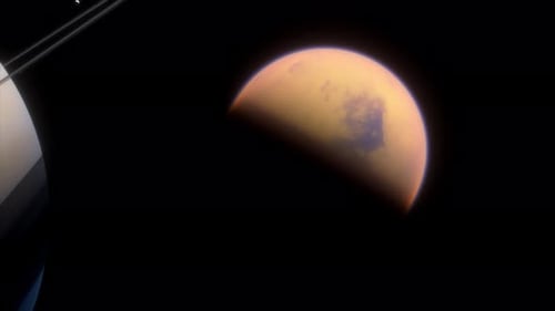 Dramatic Planetary Animation of Ringed Planet and Orbiting Moon