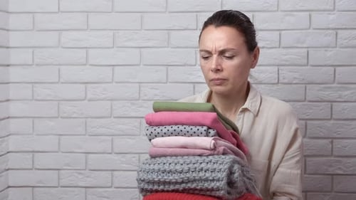 Woman with Folded Laundry, Household Chores