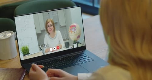 Student having a video call with a teacher