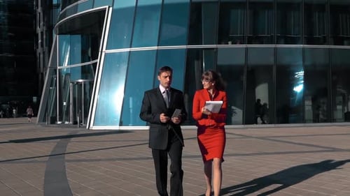Business People Discuss Work Outside Office Building