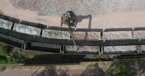Aerial View. Vast Excavation Site with an on Going Operation of Excavators Loading Stones on To