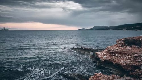 Timelapse of Sea and Evening Cloudy Sky in the Evening