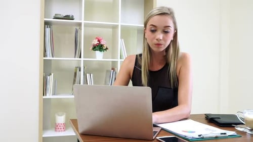 Blonde Business Woman Working at Modern Office
