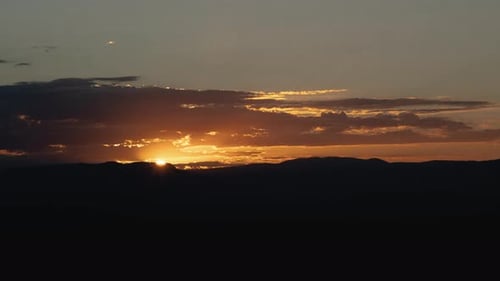 Dramatic Sunrise Over a Mountain Range