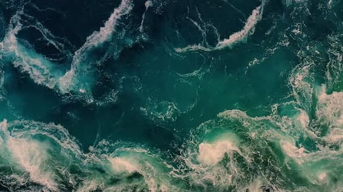 Waves of Water of the River and the Sea Meet Each Other During High Tide and Low Tide