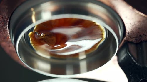 4K Close up of Flair espresso coffee machine pouring hot espresso shot