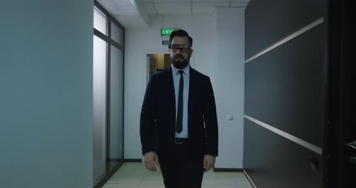 Businessman Using VR Glasses in Office Corridor