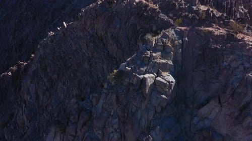 The Star Spangled banner sits tall and proud on the top of a mountain in California. Patriotic, beau