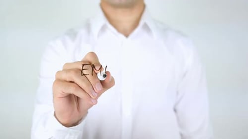 Writing Employee Motivation on Glass Surface