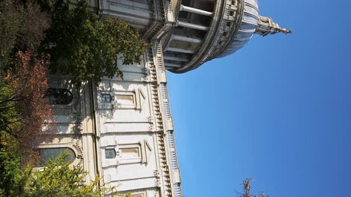 Vertical video of popular London tourist attraction and landmark of St Pauls Cathedral on a bright b