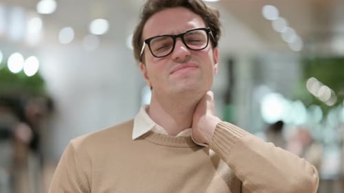 Adult Massaging Aching Neck Close Up