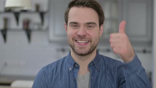 Bearded Man Smiles and Gives Thumbs Up