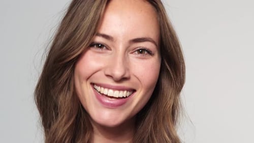 Young Woman Smiling and Laughing in Close Up