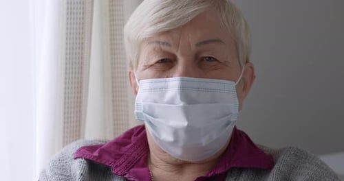 Senior Woman Wearing a Protective Mask Close Up