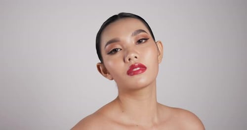 Close up of Beauty Asian woman face looking at camera